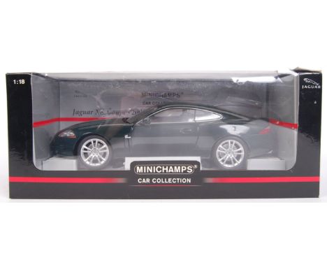 A 1:18 scale Minichamps BR British Racing Green diecast model Jaguar XK Coupe - 2006. Appears mint, within the original box.&