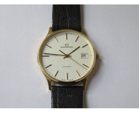 9ct GOLD GARRARD GENT'S WRISTWATCH ON LEATHER STRAP, WITH ORIGINAL BOX 