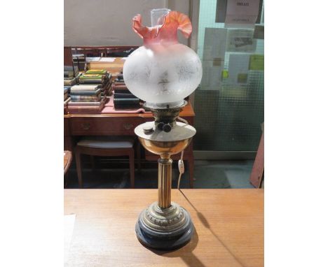 VINTAGE BRASS COLUMN FORM OIL LAMP WITH COLOURED GLASS SHADE 