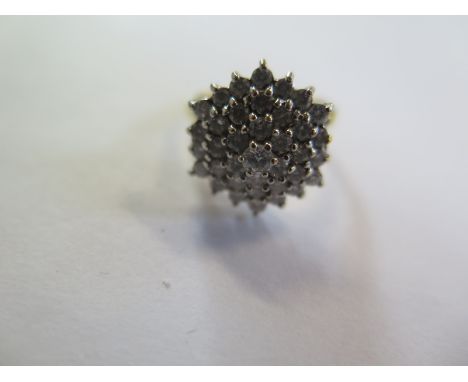 An 18ct gold and diamond cluster ring, approx 2ct, approx 7.2 grams, size O 