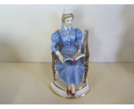 A Worcester Royal Porcelain Company figure sister London Hospital 22 of 50 - with box and certificate, in good condition, no 