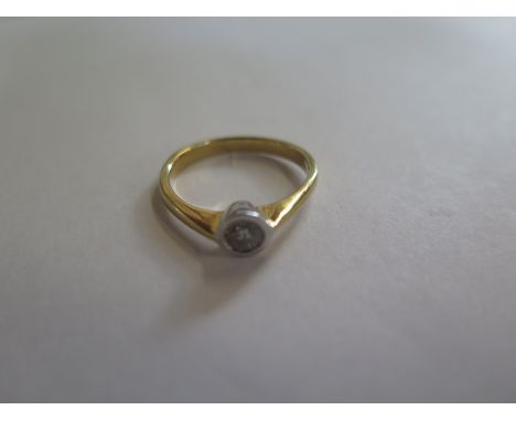 An 18ct gold and diamond solitaire ring, size P, apporx 0.20ct, approx 3.5grams - good condition 