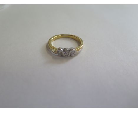 An 18ct gold and diamond three stone ring, approx 0.30ct, approx 4.1 grams, size M, new condition 