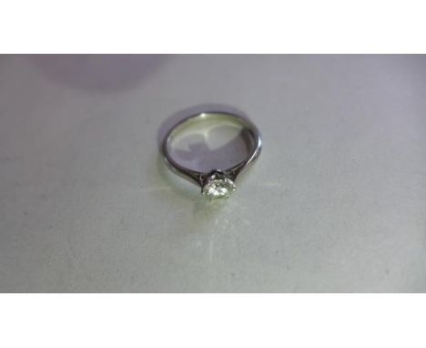 A diamond solitaire ring, single brilliant cut diamond, certified by the GIA report number 213694113, stating that the stone 