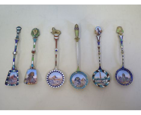 A set of six silver enamel souvenier spoons, approx 1.5 troy oz, all good condition 