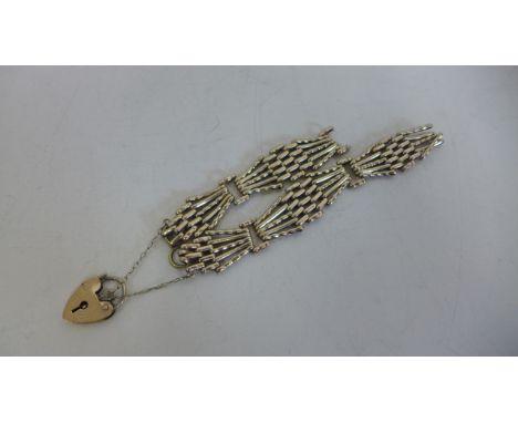 A 9ct gold gate link bracelet - approx 19 grams - chain broken 