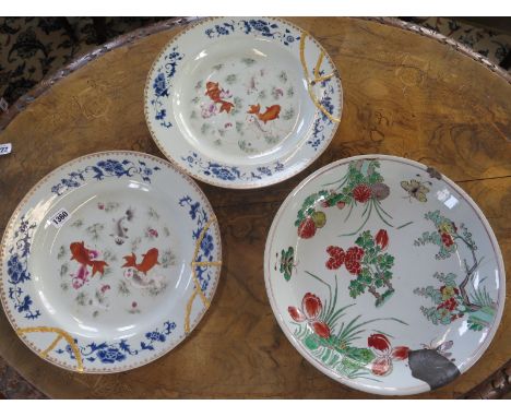 A Chinese Famille-Vert Kangxi period dish together with a pair of 18th century plates, decorated with carp, 36cm diameter, al