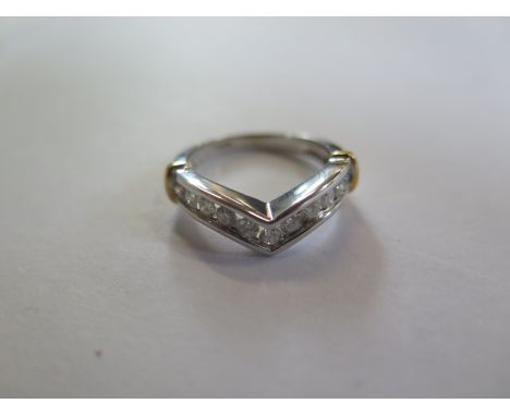 An 18ct white gold and diamond wishbone ring, size K, approx 0.60ct, approx 4.3 grams, in new condition 