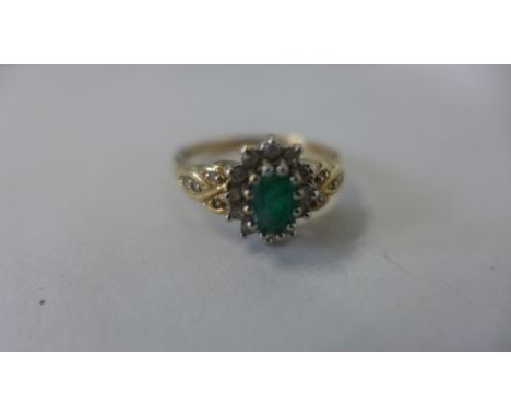 A 9ct yellow gold cluster ring, size P, approx 3 grams, some usage marks but generally good 