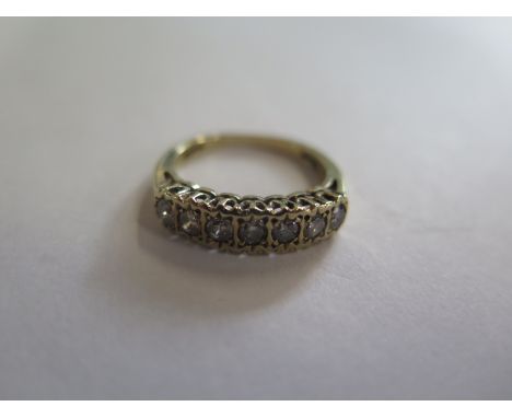 A 9ct gold diamond seven stone ring, size L, approx 0.50ct, approx 2.7 grams, in good condition 