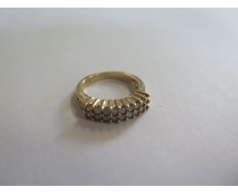 A 9ct gold and diamond dress ring, approx 3.9 grams, size L, in new condition 