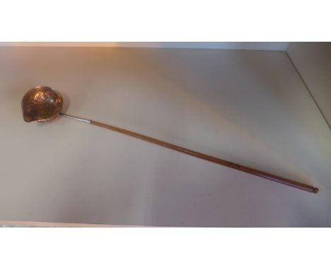 A white metal wine ladle with horn handle - 45cm long, inset with a Georgian coin, some splitting and damage to handle otherw