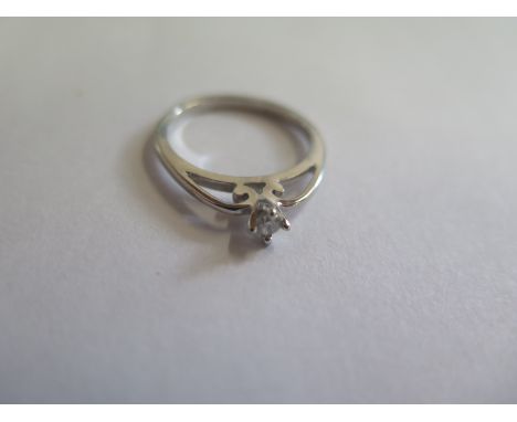 A 9ct white gold and diamond solitaire ring, size K, approx 0.08ct, approx 1.7 grams 