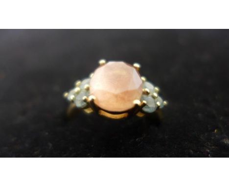 A 14ct gold tanzanite and pink stone ring, approx 1.9 grams, size N, in good condition