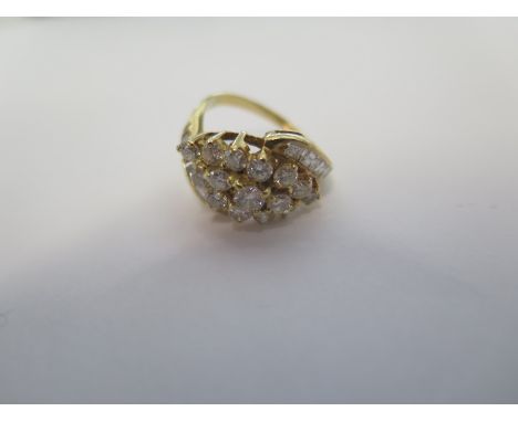 An 18ct diamond cluster ring set in yellow gold with 24 diamonds, size M, approx 5.7 grams, in good condition 