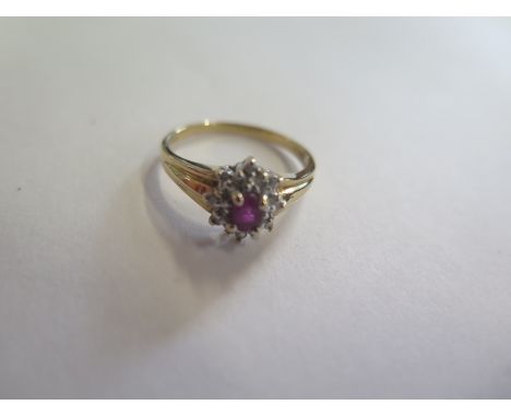 A 10ct gold ruby and diamond ring, approx 2.5 grams, size O, in good condition 