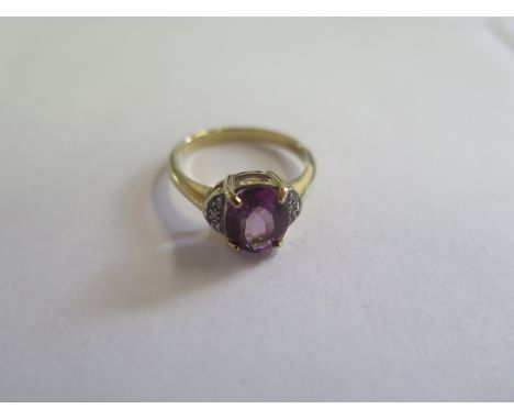 A 9ct gold pink mystic topaz and diamond ring - size N, approx 3 grams, in new condition 
