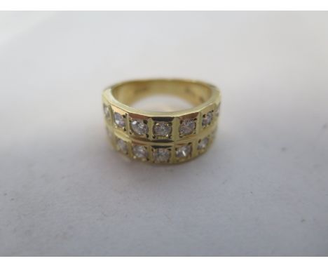 An 18ct yellow gold double row diamond ring, set with fourteen diamonds, size K, approx 8.4 grams, in good condition 