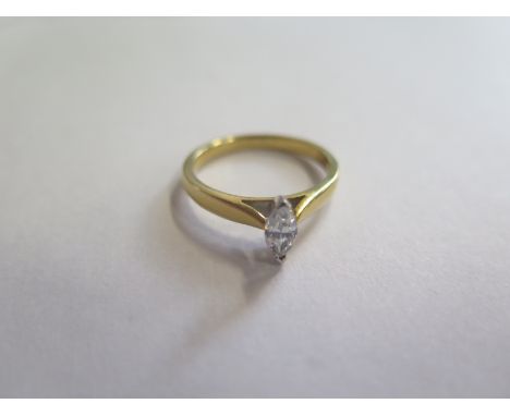 An 18ct gold and diamond marquise solitaire ring, size N, approx 3.5 grams, in new condition 