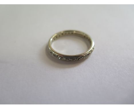 A 9ct gold and diamond full eternity ring, approx 3 grams, size R, in good condition 