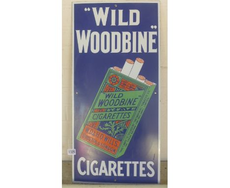 A reproduction Wild Woodbine enamel sign - 69cm x 33cm, in generally good condition 