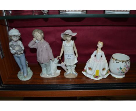 Three various Nao figures (two with original boxes),together with a Royal Doulton figurine "Old Country Roses"; and a small A