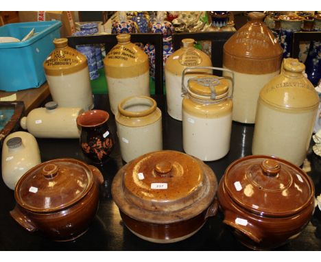 A collection of various stoneware flagons including "The Aylesbury Brewery Company", Frederick Pierman of Wallingford", "Job 