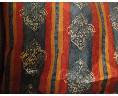 A pair of interlined curtains, the blue, red and yellow striped ground set with repeating medallions, together with a box con