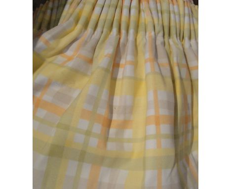 A collection of curtains to include a pair of interlined cotton curtains, the plain ground with checked yellow, orange and gr
