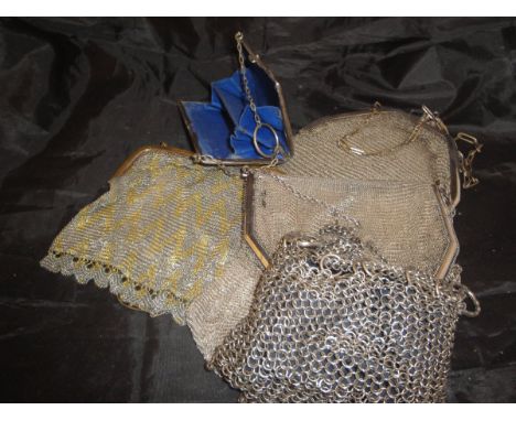 A collection of five plated/white metal and chain mail and other evening purses/bags