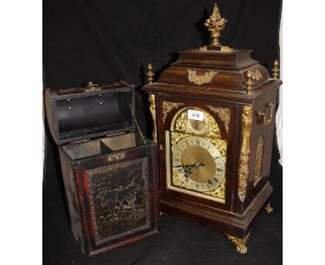 An early 20th Century oak cased mantle clock with brass embellishments, the eight day movement by Winterhalder & Hoffmeier of