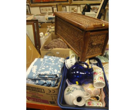 Two boxes of miscellaneous items to include Omani baskets, chinawares etc, together with a box of various textiles,fabric and