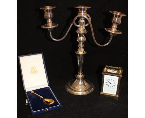A brass cased carriage clock, a silver gilt Elizabeth II Golden Jubilee commemorative spoon, limited edition No'd. 45/500 by 