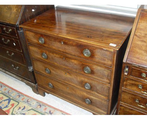 A 19th Century mahogany square front chest, the plain top with moulded edge abvoe four long graduated drawers with brass rope
