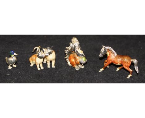 A collection of four Saturno silver and enamel animals comprising a horse, a duck, a squirrel with acorn and a cat and kitten