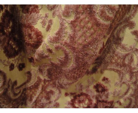A pair of brocade curtains, the gold ground with pink decoration and tassels, together with a further pair of pink and cream 