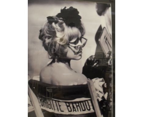 A photographic study of Brigitte Bardot in black and white, together with a photographic study of Audrey Hepburn and one furt