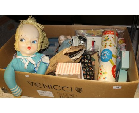 A box containing a collection of various vintage toys including a Simon and Halbig porcelain headed doll model 1909 with join