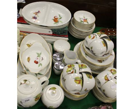 A Royal Worcester "Evesham" pattern part dinner / tea service comprising twelve cups and saucers, various plates, bowls, serv