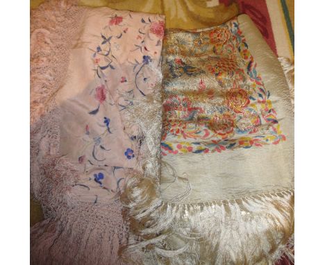 A Victorian silk shawl, the pink ground with embroidered pink, blue and cream floral motifs, together with a similar shawl, t
