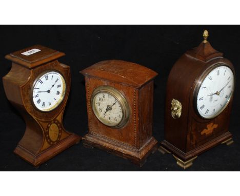 A mahogany and inlaid cased shield shaped mantle clock, the French movement by R & Co. of Paris, together with a modern mahog