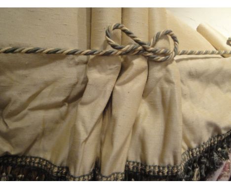 A pair of light gold ground interlined curtains, together with matching pelmet