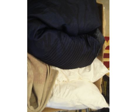 Three boxes of assorted bed linen, pillows, cushion covers, towels etc