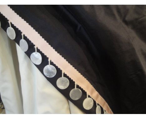 A pair of silk interlined curtains of cream and black with mother of pearl applied decoration