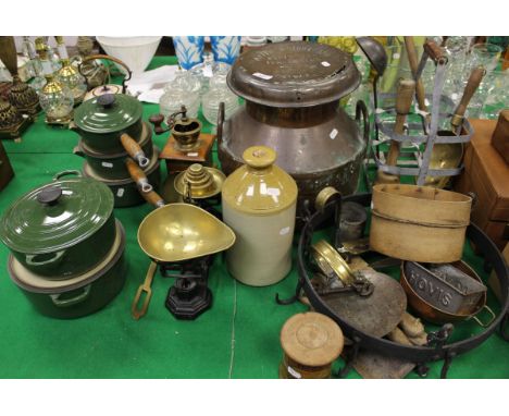 Two Le Creuset casseroles and three matching saucepans, a French coffee grinder, a pair of kitchen scales and weights, brass 