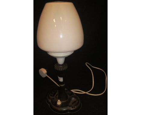 A bakelite bodied table lamp, with glass shade