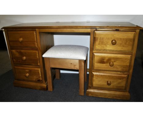 A pine dressing table and stool, W. 136cm.