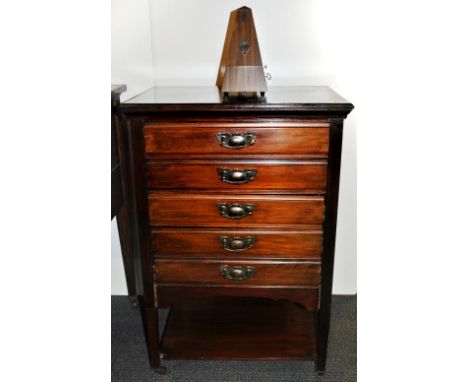 An Edwardian mahogany music cabinet and metronome, W. 52cm, H. 78cm.