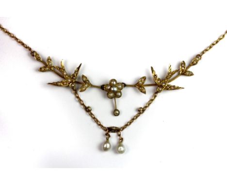 An Edwardian 9ct gold seed pearl set necklace.