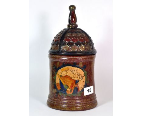 An unusual signed pottery jar and lid with scenes of the Bayeux tapestry, H. 28cm.
